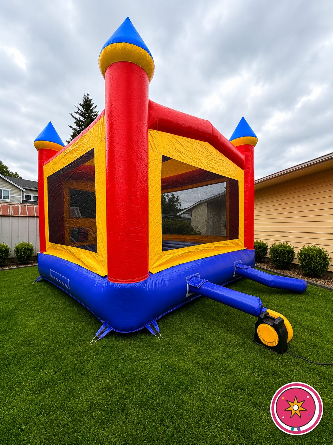 Mateo Party Co. castle bounce house delivered and set up on a backyard lawn in Snohomish County